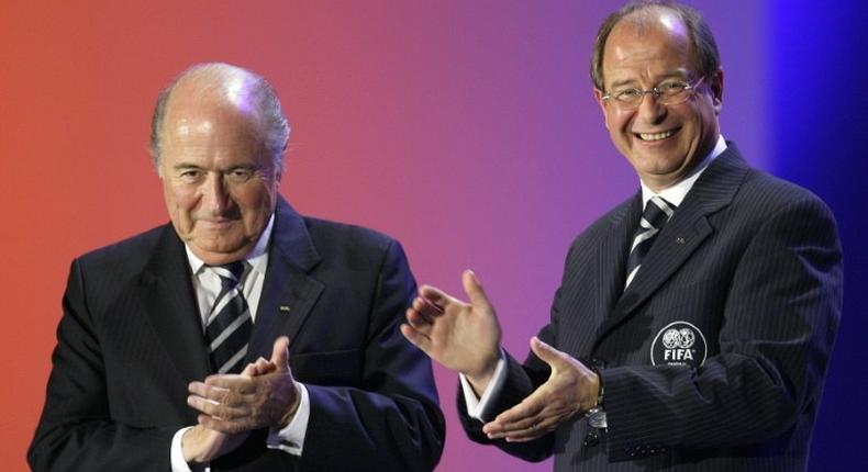 FIFA President Sepp Blatter (left) and FIFA General Secretary Urs Linsi applaud during the opening ceremony of the 57th congress of the world football governing body in Zurich on May 30, 2007