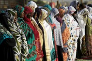 Muslim women gather during Eid al-Adha prayers in Khartoum