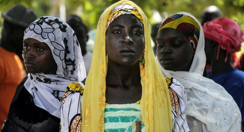 Cameroonian displaced women at a food distribution center in Koza, in the extreme northern province, west of the Nigerian border, on September 14, 2016