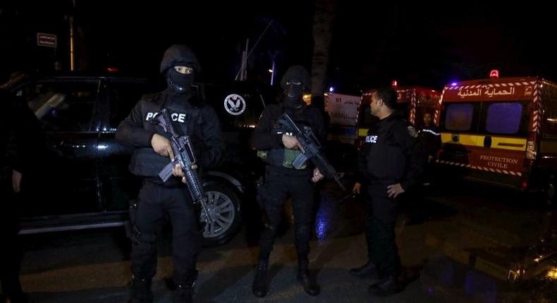 Tunisian police officers are pictured after an attack on a military bus in Tunis, Tunisia November 24, 2015. REUTERS/Zoubeir Souissi