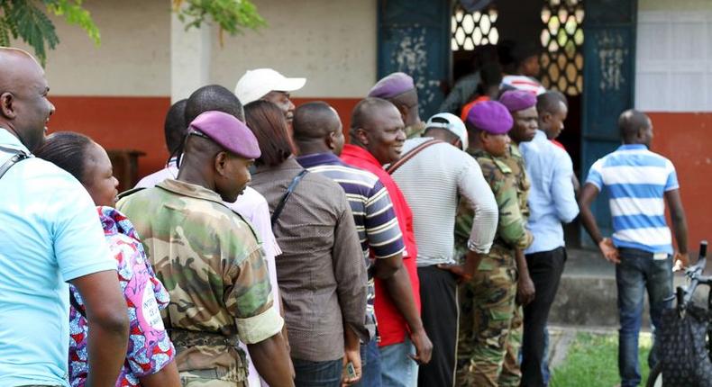 Military personnel vote at a polling station in Brazzaville, Congo, October 25, 2015. REUTERS/Roch Baku