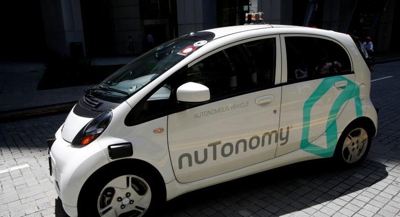 A nuTonomy self-driving taxi drives on the road in its public trial in Singapore August 25, 2016. REUTERS/Edgar Su 