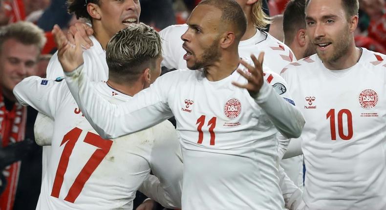 Martin Braithwaite (C) celebrates after putting Denmark ahead against Ireland - a 1-1 draw allowed the Danes to qualify for Euro 2020