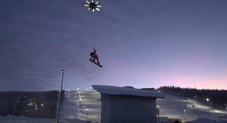 Casey Neistat being lifted by a drone 