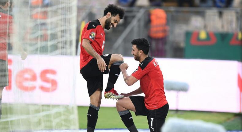 Mohamed Salah (L) celebrates after Mahmoud Trezeguet (R) scored the goal that gave Egypt victory over Morocco in an Africa Cup of Nations quarter-final in Yaounde on Sunday.