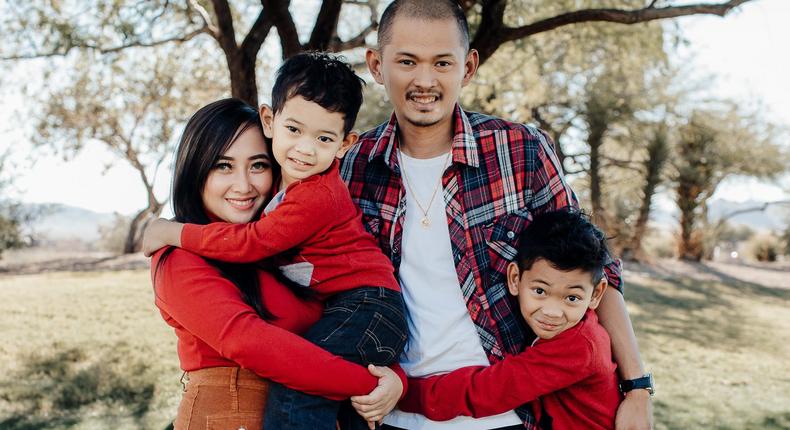 Mhay-Ann Carriza De Felipe with her two sons and late husband.