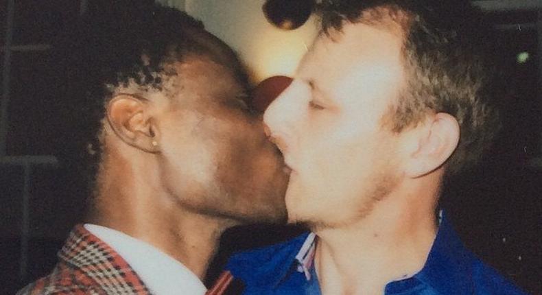 Bisi Alimi and Anthony sharing a kiss