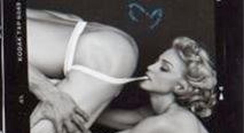 Madonna eating a man's butt