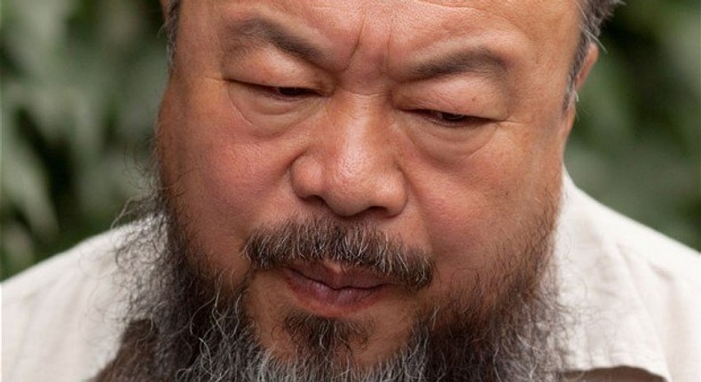 China returns dissident artist Ai Weiwei's passport after four years