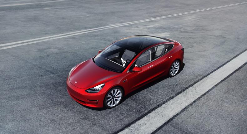 Tesla slashed prices for its Chinese-made Model 3 sedans and will power them with cheaper batteries, Reuters reports.