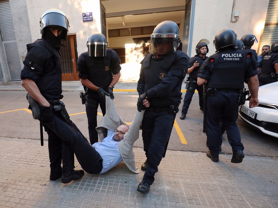 Another protester forcibly removed outside Unipost.