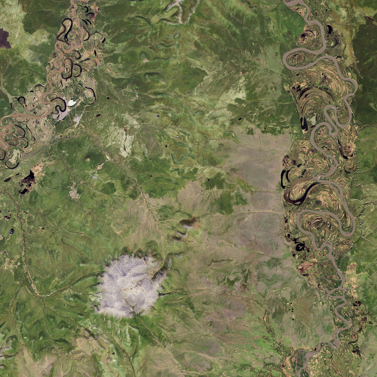 Syberyjska wieczna zmarzlina i krater. Zdjęcie satelitarne obszaru wokół krateru Batagaika, który powstał w wiecznej zmarzlinie Syberii