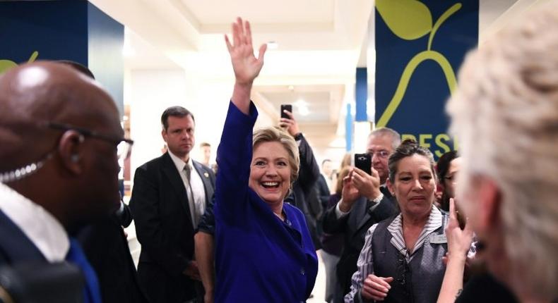 US Democratic presidential nominee Hillary Clinton greets empolyees of the Mirage - Las Vegas Hotel & Casino, in Nevada, on November 2, 2016