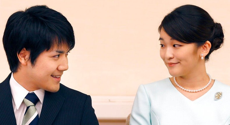 In this Sept. 3, 2017, file photo, Japan's Princess Mako and her fiance Kei Komuro look at each other during a press conference at Akasaka East Residence in Tokyo.
