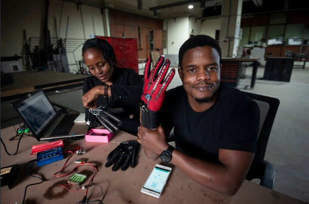 Roy Allela tries out his smart gloves 