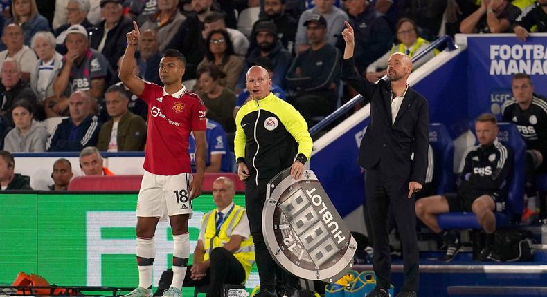 Manchester United manager Erik ten Hag brings on Casemiro during the Premier League match at the King Power Stadium on September 1, 2022.