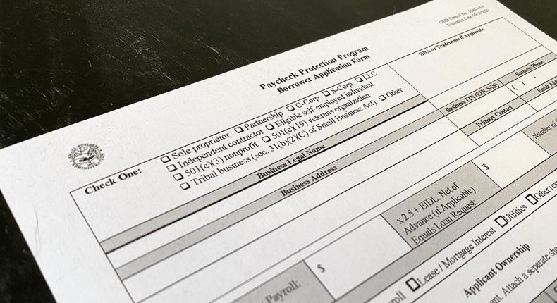 A page from the PPP loan application that people have to fill out for financial support due to the continuing outbreak of the coronavirus disease (COVID-19) is pictured on a desk in New York U.S., May 7, 2020.
