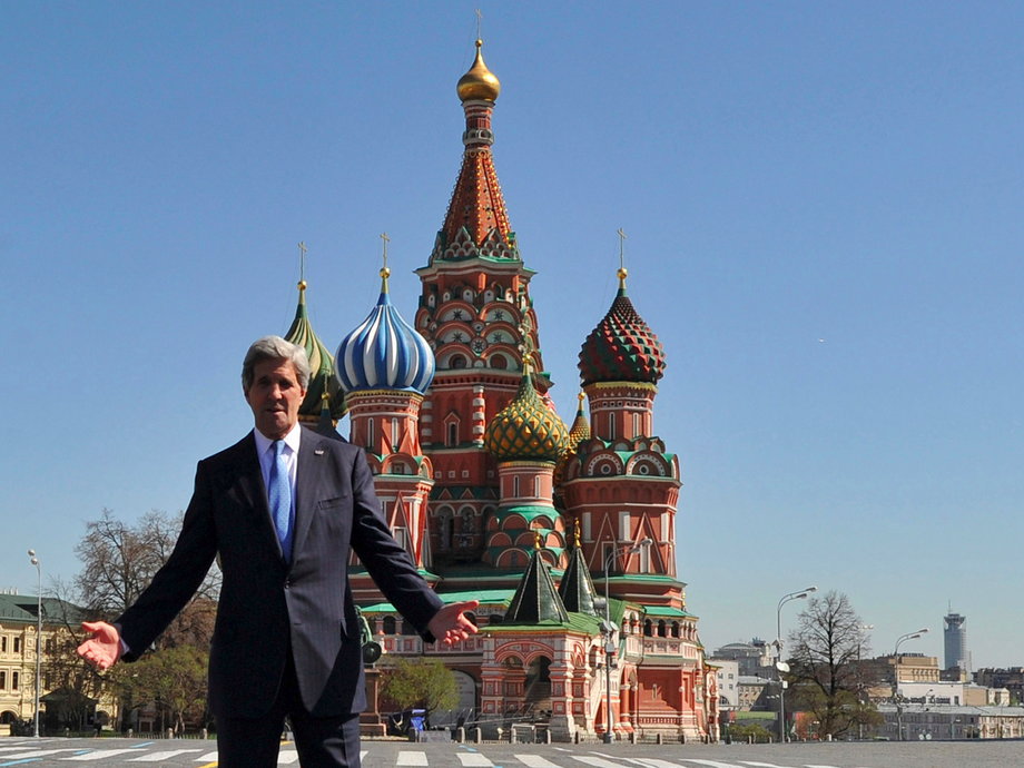 RUSSIA: Kerry poses in front of St. Basil's cathedral during a walk at the Red Square in Moscow on May 7, 2013.
