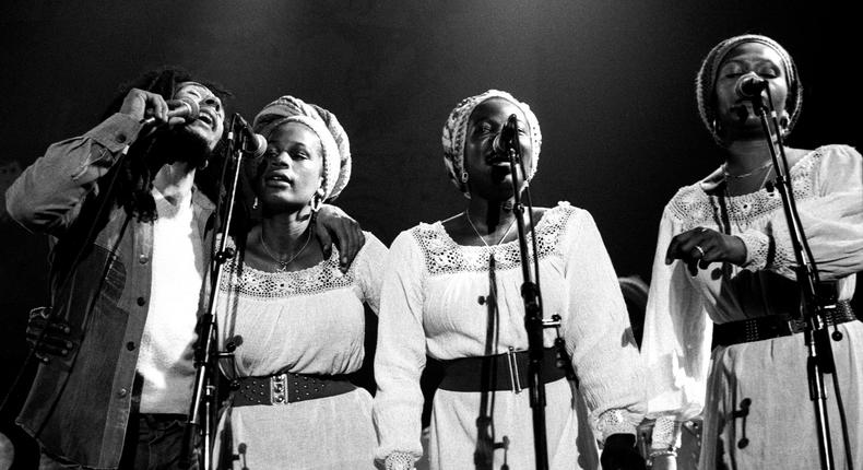 Bob Marley performing with  Judy Mowatt, Rita Marley, and Marcia Griffiths of the I Threes in 1977.Photo 12/Universal Images Group via Getty Images