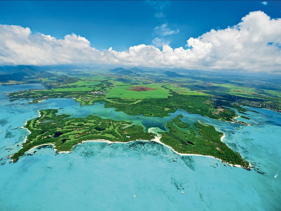 At Mauritius' Ile aux Cerfs Golf Club, players can enjoy a championship golf course set on a stunning private island. The course covers 38 hectares of the island and includes nine lakes, making for a challenging game.