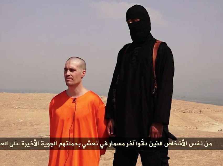 Novinar Džejms Foli, par trenutaka pre nego što mu je dželat Islamske države odrubio glavu