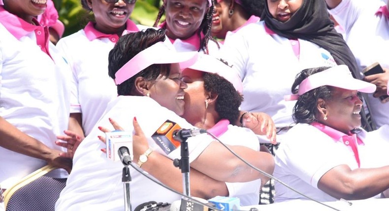 Kirinyaga Governor Anne Waiguru embraces Homa Bay Woman Rep Gladys Wanga during launch of Women for Building Bridges in Kenya initiative (Twitter)