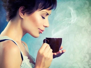 Beautiful Girl With Cup of Coffee