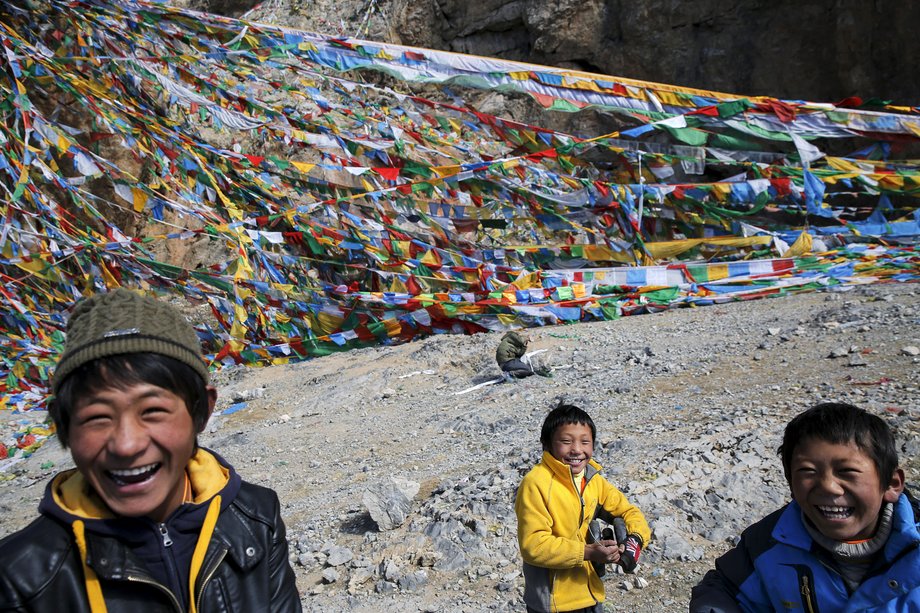 Prayer flags on the shores of the  Namtso lake.