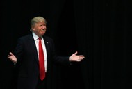 U.S. Republican presidential candidate Trump reacts as he is introduced during a campaign event in C