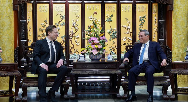 Elon Musk meets with Chinese Premier Li Qiang in Beijing.Wang Ye/Xinhua/AP