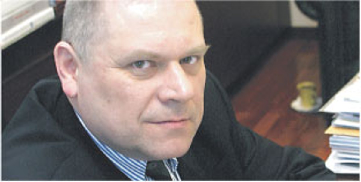 dr Janusz Fiszer, partner w Kancelarii Prawnej White & Case i docent UW