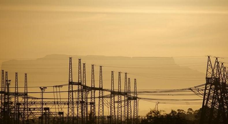 Pylons carry electricity from South African power utility Eskom's Koeberg nuclear plant near Cape Town, in this picture taken November 28, 2015. 