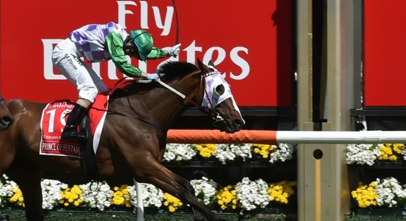 Jockey Michelle Payne crosses the line on Prince of Penzance to become the first female jockey to win a Melbourne Cup on November 3, 2015