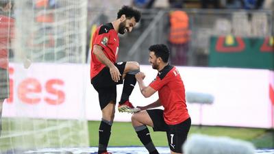 Mohamed Salah (L) celebrates after Mahmoud Trezeguet (R) scored the goal that gave Egypt victory over Morocco in an Africa Cup of Nations quarter-final in Yaounde on Sunday.