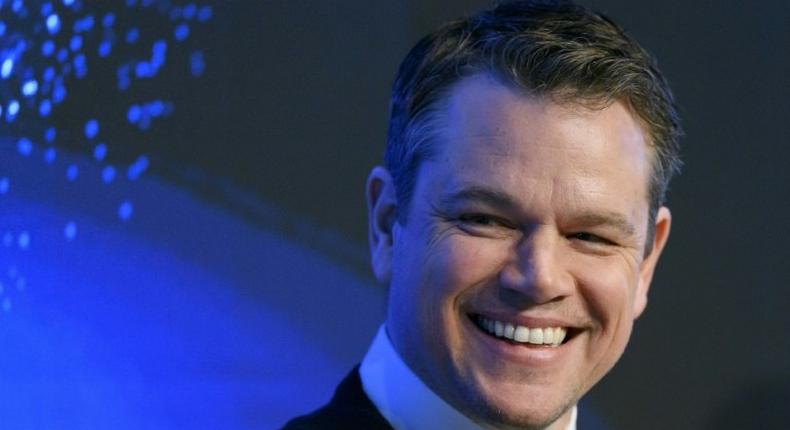 US actor Matt Damon smiles as he takes part in a meeting on the opening day of the World Economic Forum, on January 17, 2017 in Davos