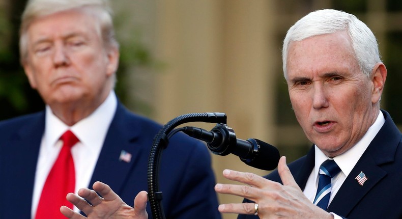 Former Vice President Mike Pence, right, speaks as former President Donald Trump looks on.Alex Brandon, File/AP Photo