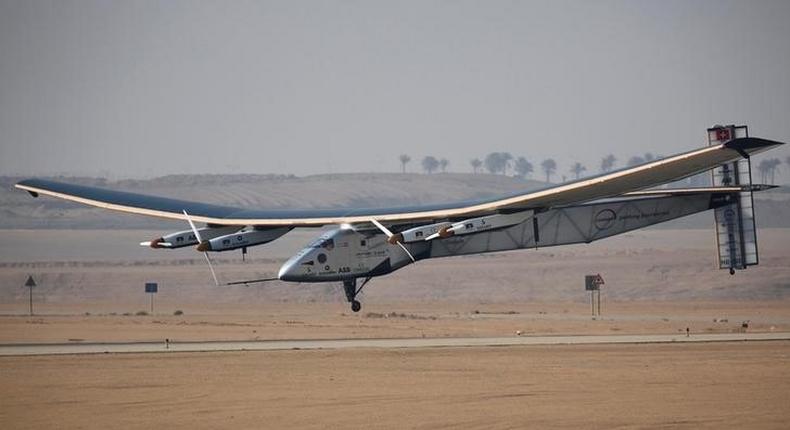 Solar Impulse 2, a solar powered plane piloted by Swiss aviator Andre Borschberg, is seen as it prepares to land at Cairo Airport, Egypt July 13, 2016. REUTERS/Amr Abdallah Dalsh