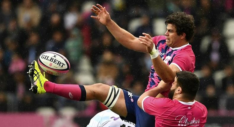 Stade Francais' No. 8 Jonathon Ross jumps for the ball during their French Top 14 rugby union match against Racing 92, at the Jean Bouin stadium in Paris, on April 30, 2017