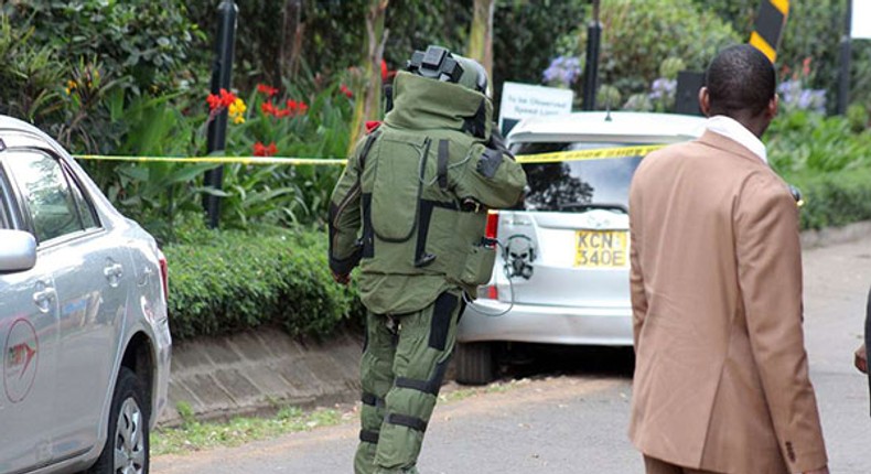 A Kenyan bomb expert at a past scene