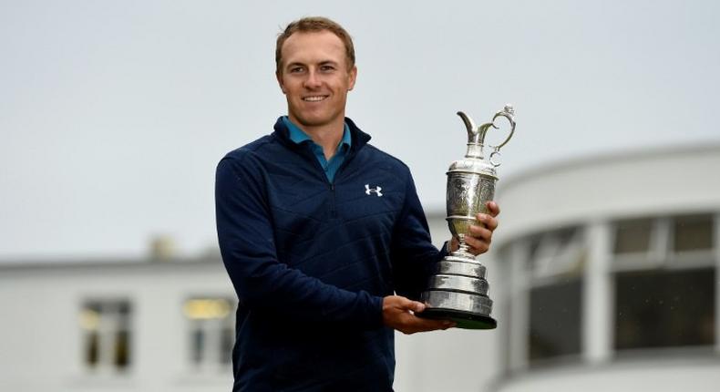 US golfer Jordan Spieth poses for pictures with the Claret Jug