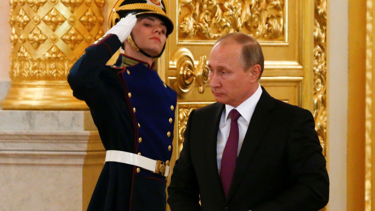 Russia's President Putin arrives for a ceremony of receiving diplomatic credentials from foreign amb