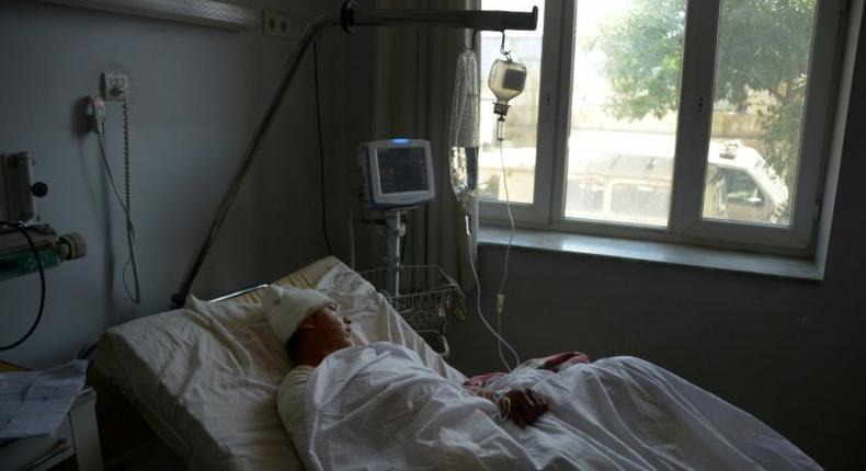 A wounded Afghan soldier in hospital in Mazar-i-Sharif on April 22, 2017, following a bloody Taliban attack on an army base