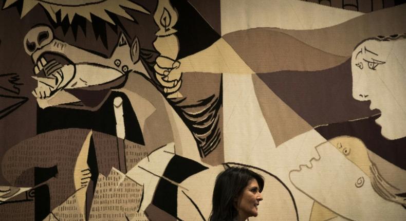 Then-US ambassador to the United Nations Nikki Haley walks past a replica of Guernica by Pablo Picasso at the UN headquarters in January 2018