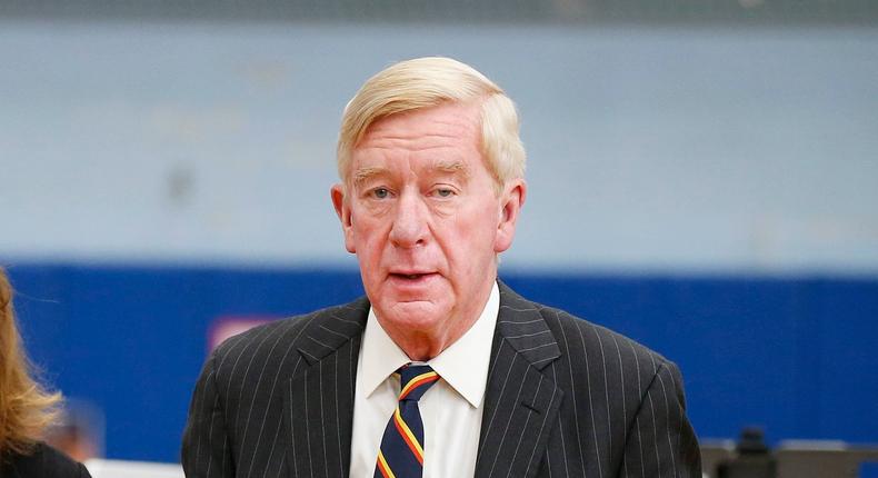 Libertarian vice presidential candidate, former Massachusetts Gov. Bill Weld, and his wife Leslie Marshall, hold their ballots after leaving the voting booth at the John F. Kennedy Elementary School in Canton, Mass., Tuesday, Nov. 8, 2016. (AP Photo/Michael Dwyer)