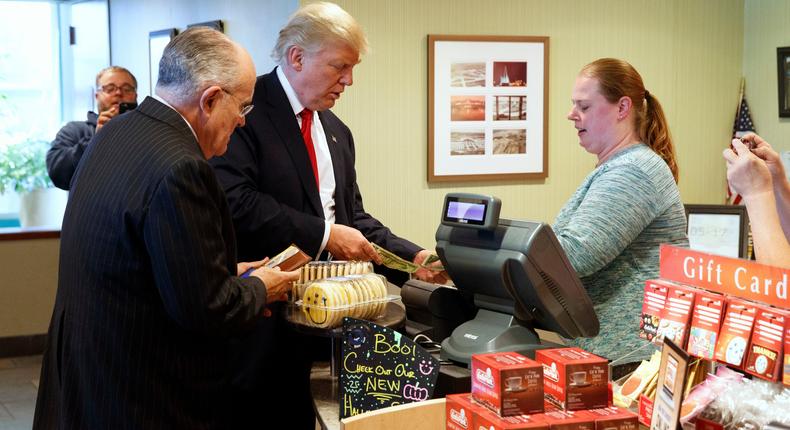 Rudy Giuliani and Donald Trump visiting the restaurant Eat'n Park on October 10, 2016, in Moon Township, Pennsylvania.