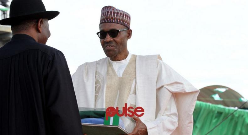 Former president, Goodluck Jonathan hands over power to Muhammadu Buhari.