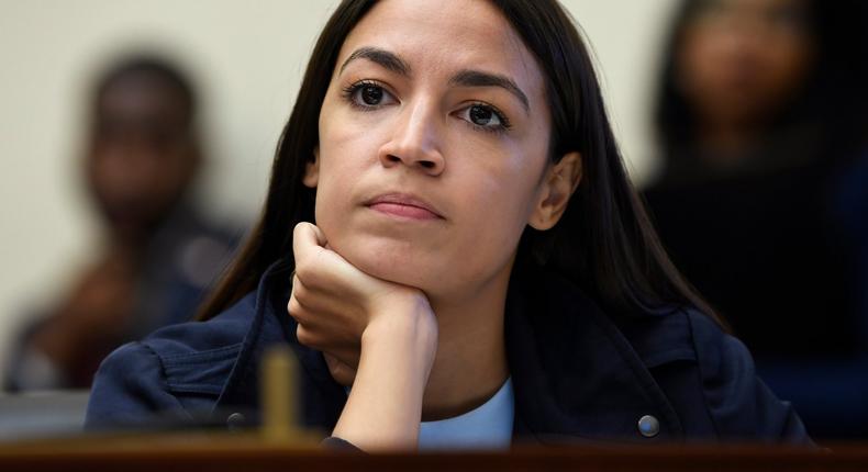 Rep. Alexandria Ocasio-Cortez, D-N.Y., listens as Federal Reserve Chairman Jerome Powell testifies before the House Financial Services Committee on Capitol Hill in Washington, Wednesday, July 10, 2019. (AP Photo/Susan Walsh)