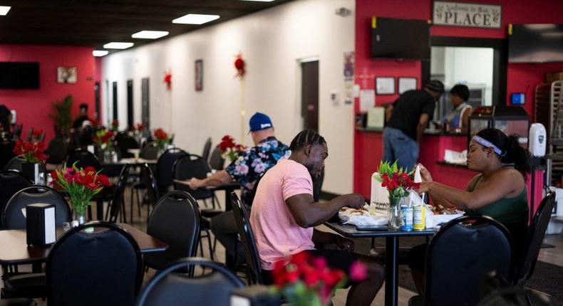 Haitians at a Haitian restaurant in Springfield, Ohio, on September 12, 2024.ROBERTO SCHMIDT/Getty Images