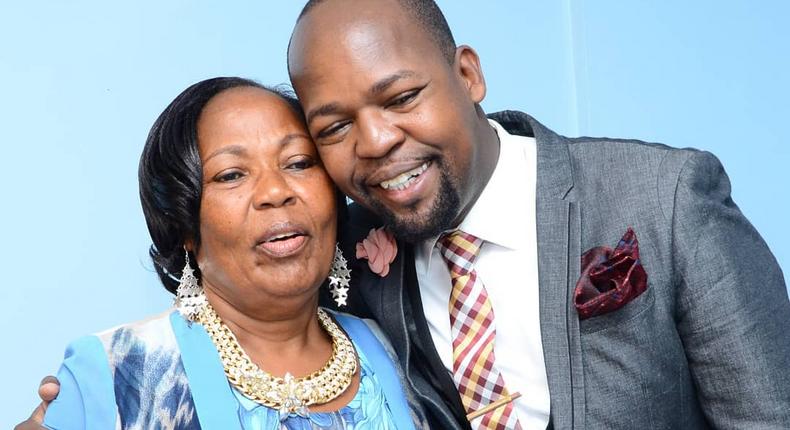 Alex Mwakideu with his mother 