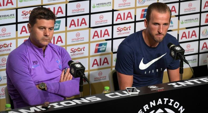 Mauricio Pochettino (L) said in Singapore that his team 'deserved to win' last month's Champions League final